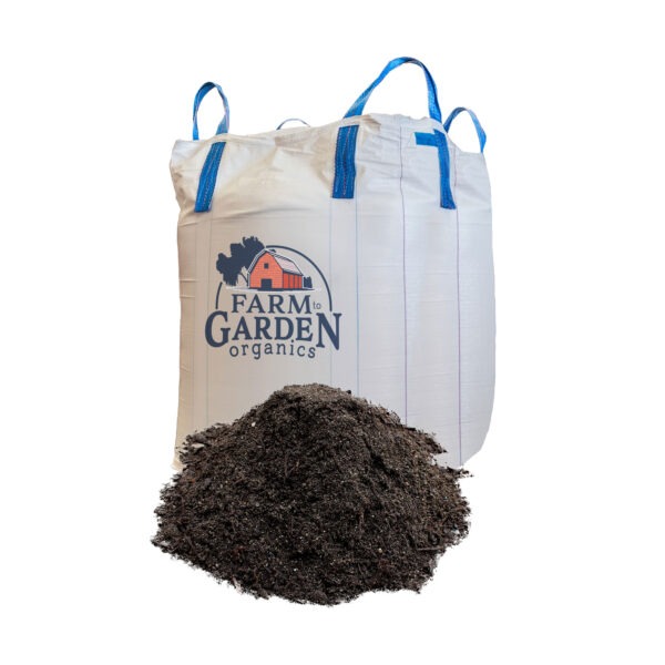 bulk bag with farm to garden logo and pile of garden blend soil developer